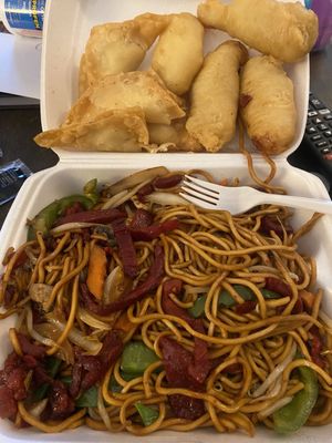 Pork lo mein, chicken fingers, and crab Rangoon.