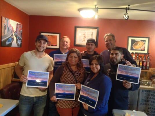 Graduates of a 4 day Barista / Coffee Business Training course with their certificates of completion.