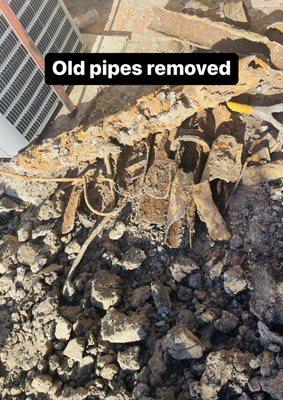 OLD PIPES REMOVED FROM UNDER HOUSE