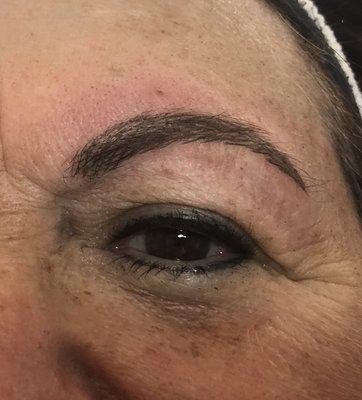 Close up view of right microbladed brow.