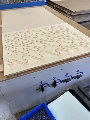 Custom veneer panels with CNC details