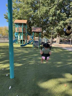 Toddler swings and a great view of the play sets here!