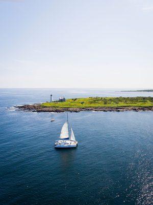 Sail past an historic lighthouse