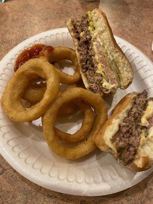 Black Meg burger (cut in half) w/ onion rings