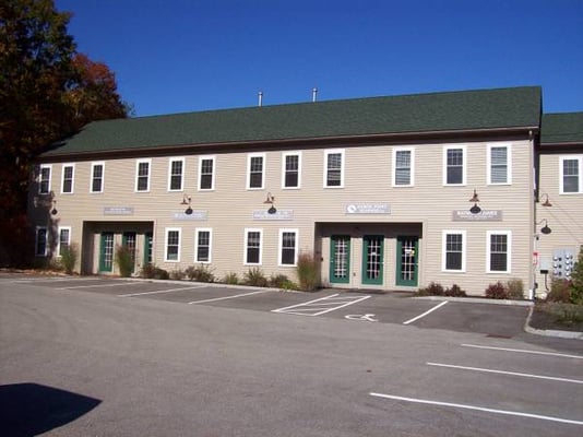 My office is on the left side of this building. Middle door and up the stairs.