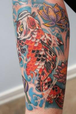 Koi fish swimming up-hill represent struggle & overcoming.