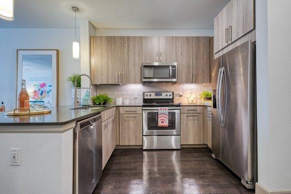 Gourmet kitchen finished with high end appliances and cabinets, located in Stone Oak