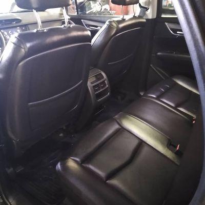 After Photo Of The Backseat Of A Black Interior Cadillac. Absolutely Exquisite  and Spotless.