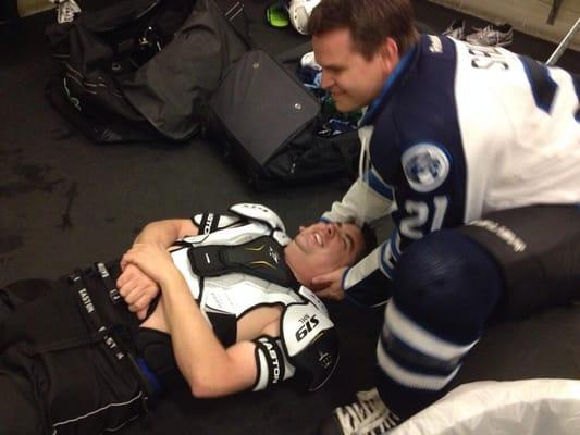 Adjusting hockey teammates in the locker room - to keep them on the ice!