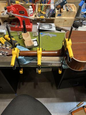 Heat-bending a classical guitar neck.