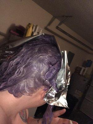 Toning my hair with T18 toner. Yes once again a purple that I know will turn my hair..... PURPLE.