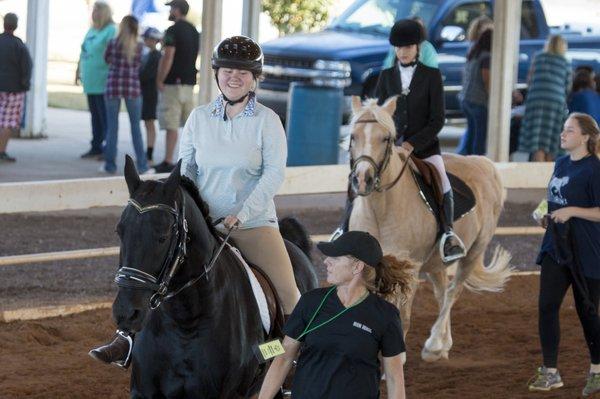 Emily is a rider with Autism.  Horseback Riding and competing helps build confidence and a place where she feels she can fit in.