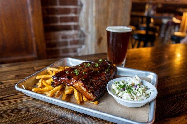 Half Slab Baby Back Ribs, bbq rubbed, seasoned fries, cole slaw