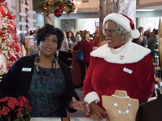 Six-foot upsidedown Christmas wreath Designs by Eugene Divine is doing Tyler Perry's Christmas movie