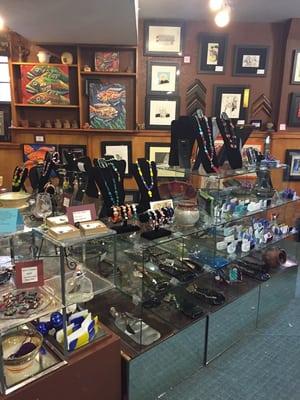 Unique handcrafted gifts and jewelry along with custom picture framing.  Art from local artisans.