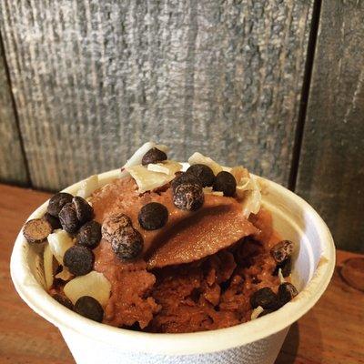 Chocolate ice cream made with cashew milk, enjoy life chocolate chips & coconut chips