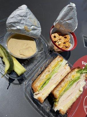 Sandwich, pretzels, hummus