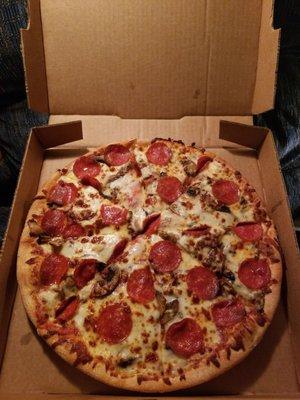 Medium Pepperoni and mushroom pizza.