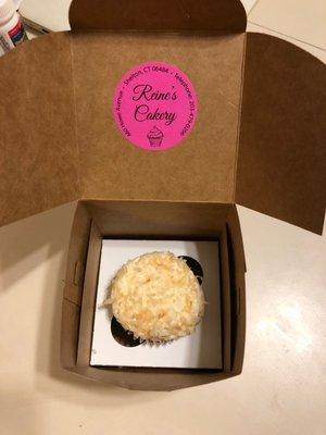 Coconut cupcake sweetly packaged.