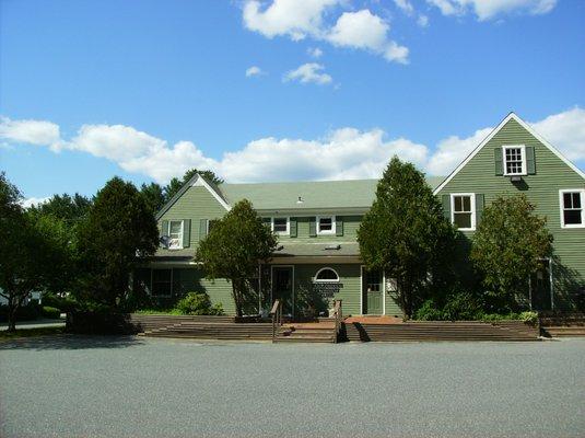 A view of our building from the parking lot (opposite side of street view).