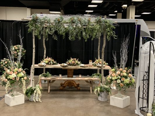 Bridal show set up.  This white birch arch is available as a rental for your wedding/party