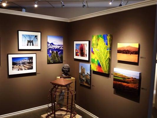 Some of our canvases and plexiglas prints on display at Parkland Gallery, by Ken Stanback!