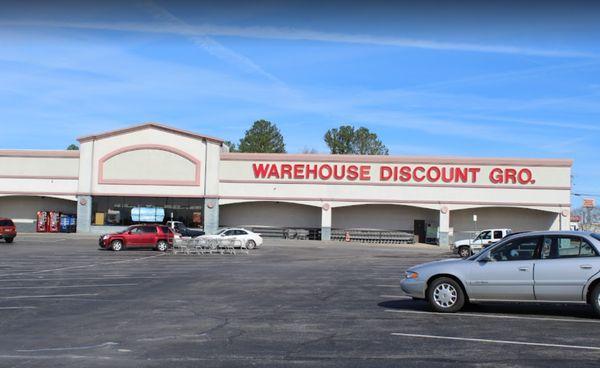 Warehouse Discount Groceries Town Square front entrance and signage.