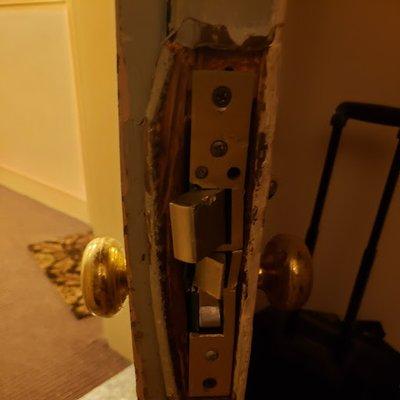 Door repair and lock installation on damaged door and lock