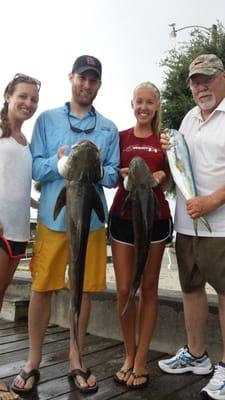 clients on a offshore deep sea trip with cobia and maui