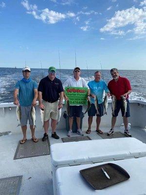 Awesome limit of Rockfish for these happy customers!