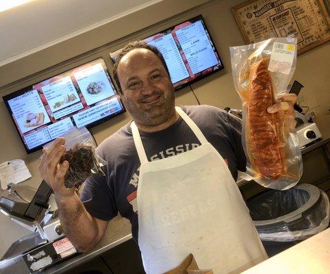 Owner, Mr Armond, holds up his no-Sugar beef jerky and newest creation!!