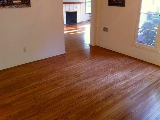 My dining room, entry, and living room in back. These are the original 75 year-old hardwood that now made to look new.