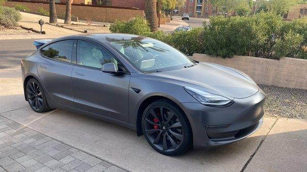 Matte charcoal wrap on Tesla