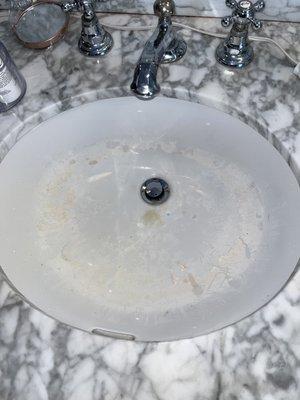 Before picture of a messy sink