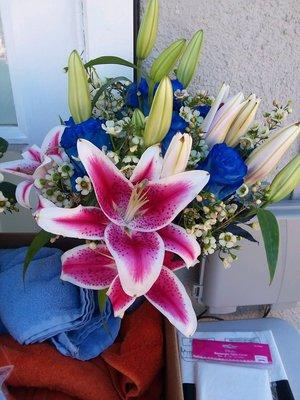 My bridal bouquet (blue roses & starfire lilies)