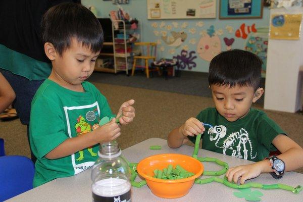 Making necklaces for St. Patrick's Day