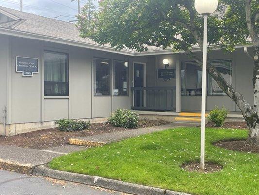 Entryway, with plenty of nearby parking spaces.