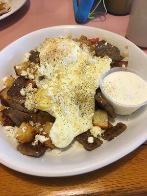 Gyro skillet with over medium eggs and breakfast potatoes( and added pepper... pic too late)