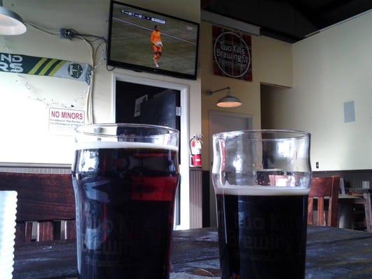 Cocoa Porter on the right.  Spire Mountain (guest cider tap) on the left.  Timbers match on the screen.