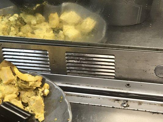 The salad bar was filthy. I pointed out the dirt and black stuff coming out of the vents.