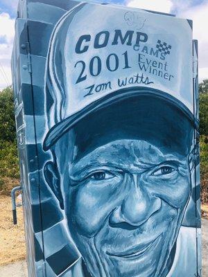 Mural commerates Tom Watts, racing car winner.