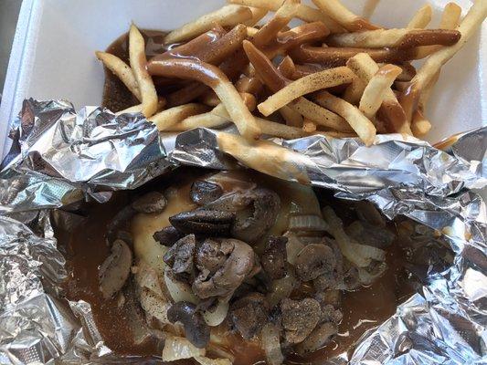 Black Angus hamburger steak with Swiss, Mushrooms, Onions smothered in gravy