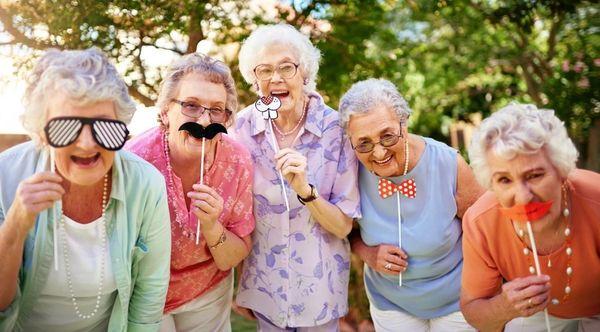 "Fun times at Senior Day KC in Lenexa! These wonderful ladies are all smiles, enjoying each other's company and making great memories!"