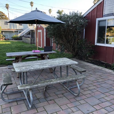 It's not swanky but you can work outside on the patio. WiFi is great out back at these wooden tables.