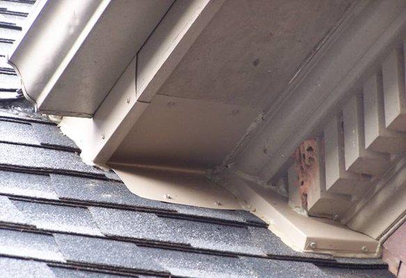 Soffit repair on a dormer roof intersection, that will keep squirrels and raccoons from gaining access in the future.