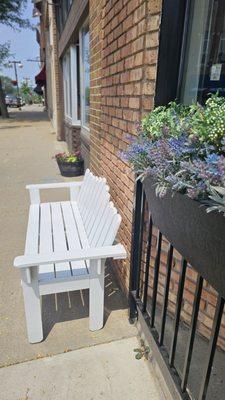 Shopping companions have seating outside and inside to wait comfortably.