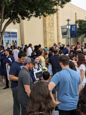 Everyone meeting their graduates outside for that requisite photo op