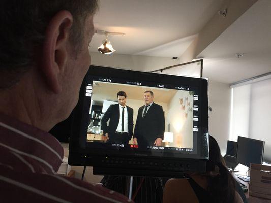 Director David Zucker with actors Ryan Caltagirone and Daniel Riordan on the set of RevealIt promo video.