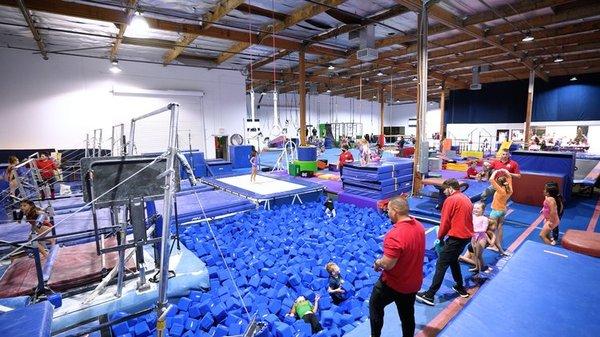 Campers flip in the bungees, fly on the zip-line, cannonball onto the airmat, while learning the fundamentals of each Olympic apparatus.