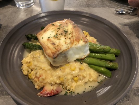 Halibut over Lobster risotto with asparagus